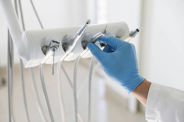 Professional Dental Implants technician working in Ives Estates, FL